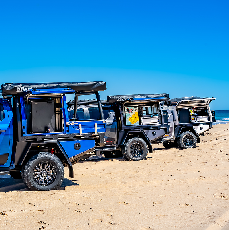 blue canopies on beach