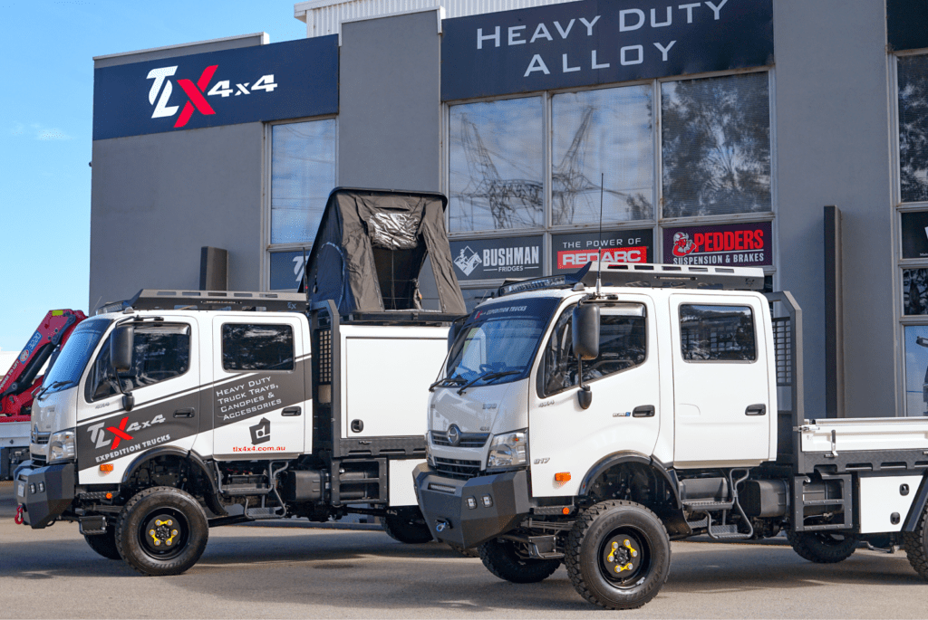 expedition trucks outside workshop