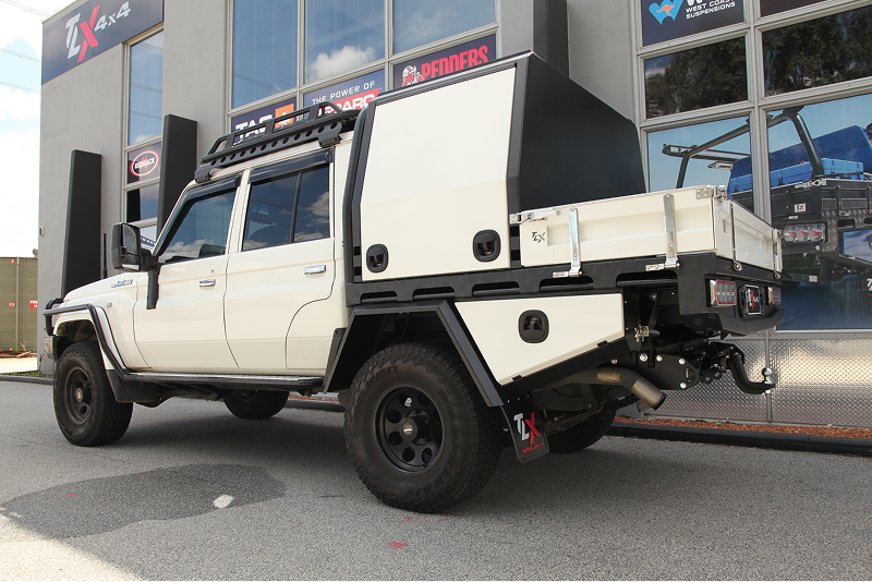 white landcruiser at office